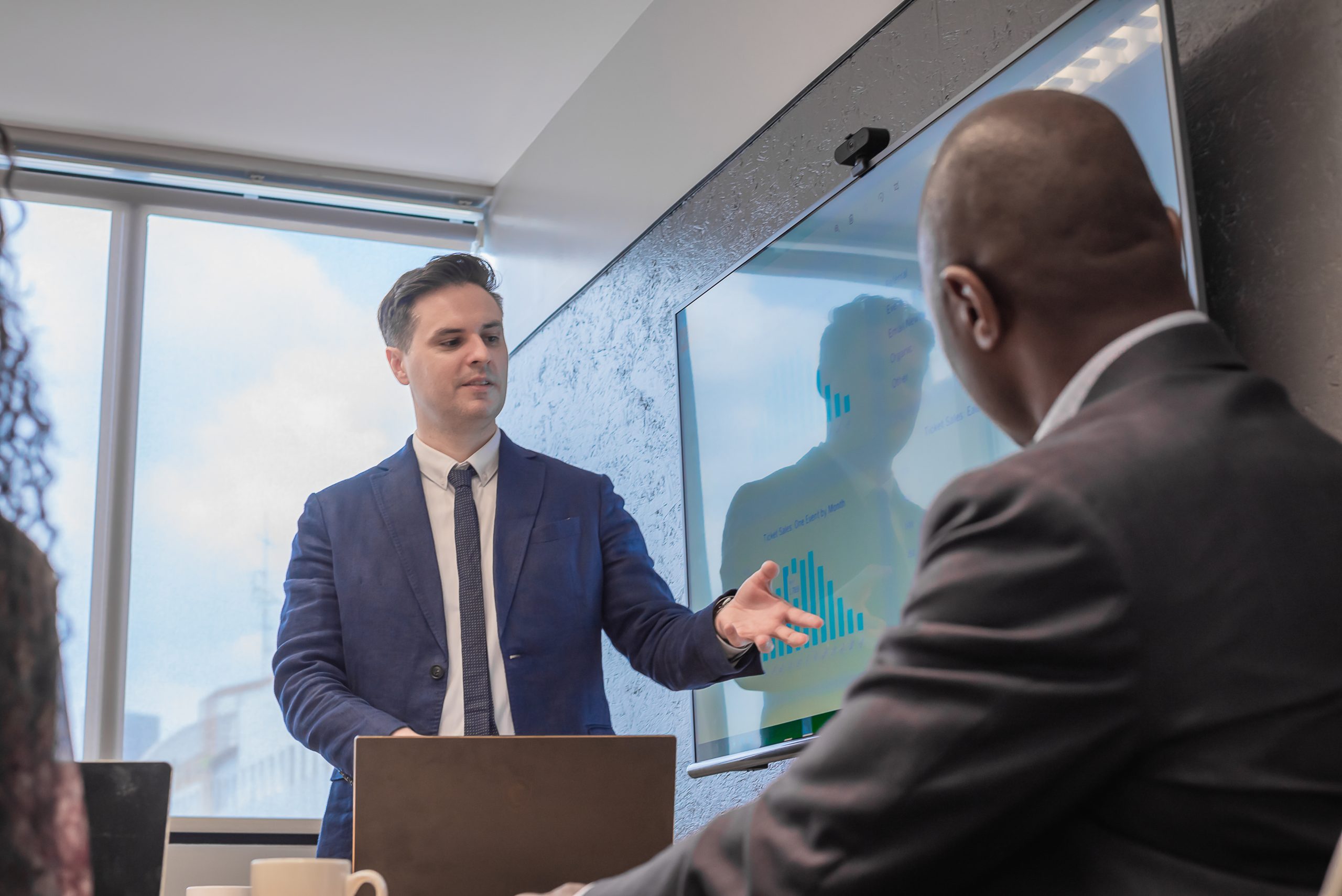 business man plans future projects to make company profitable p